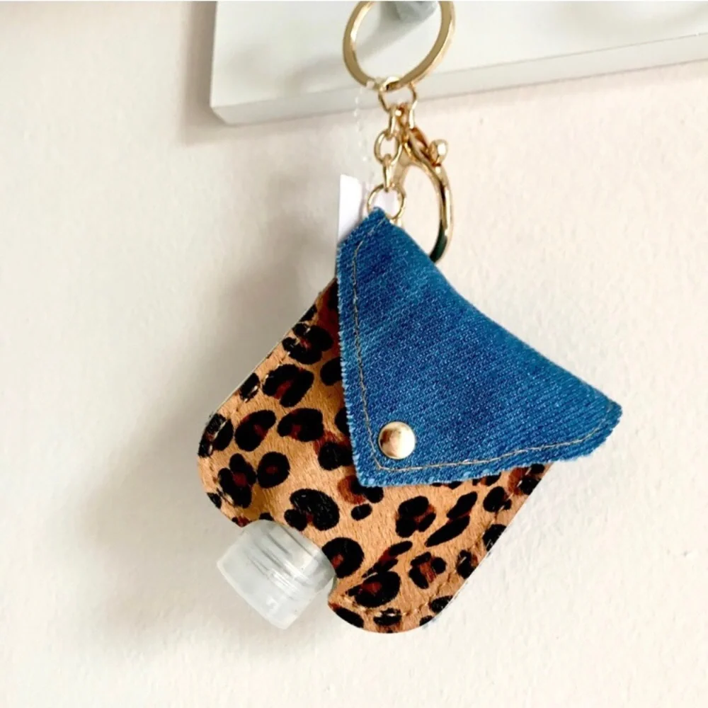 LAST ONE: Genuine leather hand sanitizer keychain holder in denim leopard - Picture 1 of 3